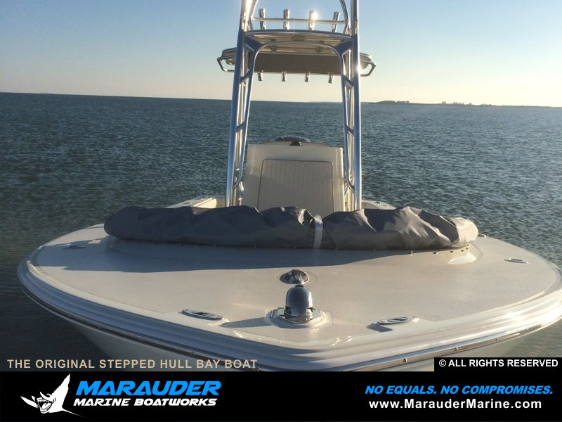 Side view of stepped hull skinny water boat in Stepped Hull Bay Boats photo gallery from Marauder Marine Boat Works