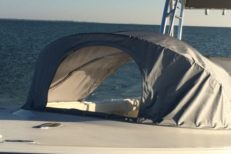 Photo of boat with front tent cover protection